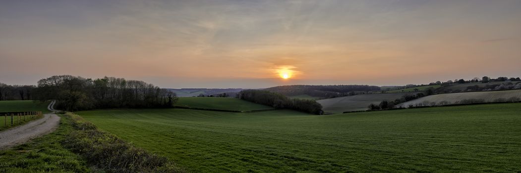 Panoramic view of landscape overlooking fields at sunset in The Chilterns, England