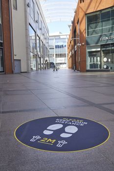High Wycombe,England-June14,2020:2Metre social distance signs on floor in shopping mall in readiness for re-opening of shops after Covid19 pandemic