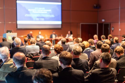 Round table discussion at business convention and Presentation. Audience at the conference hall. Business and entrepreneurship symposium.