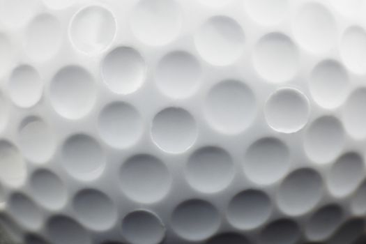 close up view showing dimples on a golf ball