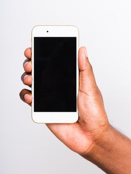 Closeup hand black man holding mockup white modern digital mobile smart phone blank screen on hand, studio shot isolated on white background