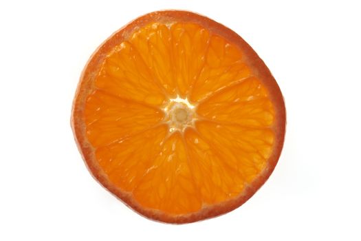 Overhead view of slice of orange on plain background