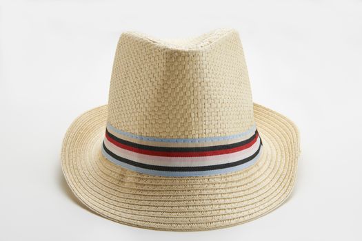 Straw man's Panama hat isolated on white background