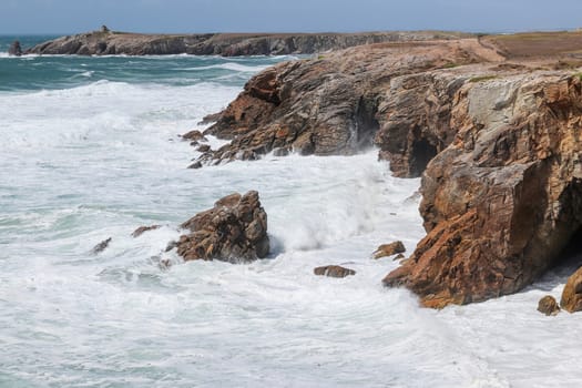 Spectacular natural cliffs on beautiful and famous coastline Cote Sauvage on peninsula Quiberon, Brittany (Bretagne), France, Europe