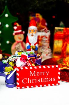 Christmas ornaments decorations and gifts under the  Christmas tree.