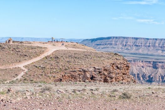 The starting point of the 5-day Fish River hiking trail near Hobas. People are visible