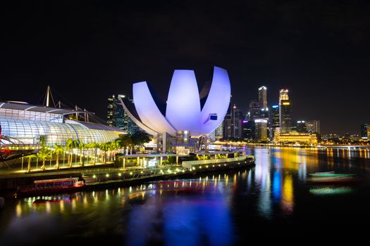 Marina Bay, Singapore - November 24th 2019: City skyline with ArtScience museum in the foreground at night
