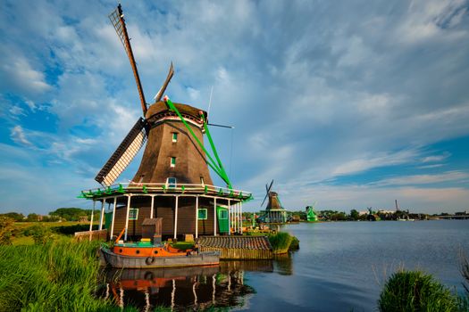 Netherlands rural lanscape - windmills at famous tourist site Zaanse Schans in Holland. Zaandam, Netherlands