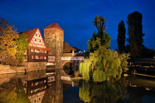 Nuremberg city houses on riverside of Pegnitz river from Maxbrucke (Max bridge). Nuremberg, Franconia, Bavaria, Germany