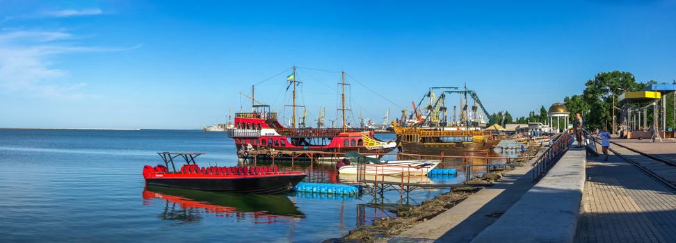 Berdyansk, Ukraine 07.23.2020. Pleasure boats on the embankment of the Azov Sea in Berdyansk, Ukraine, on a summer morning