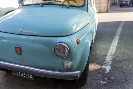 terni,italy august 28 2020:detail of a light blue vintage fiat 500