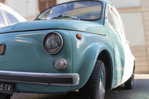 terni,italy august 28 2020:detail of a light blue vintage fiat 500