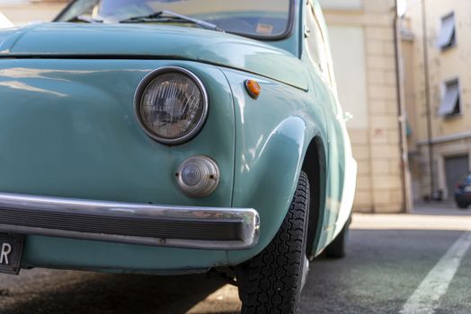 terni,italy august 28 2020:detail of a light blue vintage fiat 500
