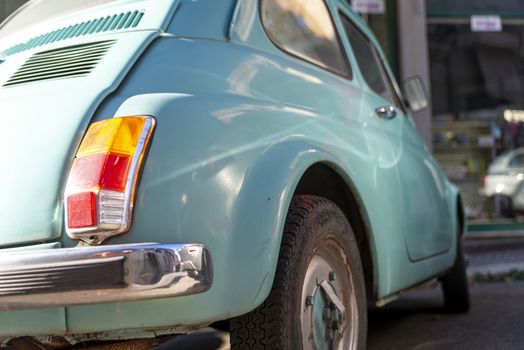 terni,italy august 28 2020:detail of a light blue vintage fiat 500