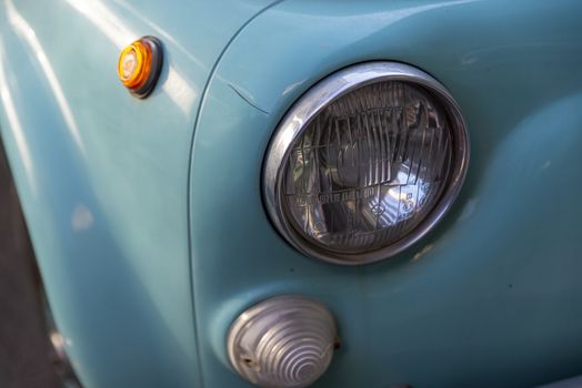terni,italy august 28 2020:detail of a light blue vintage fiat 500