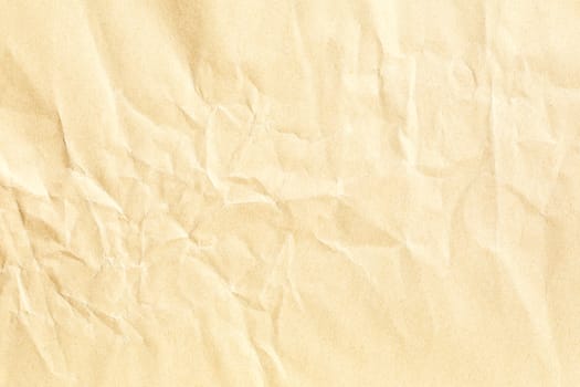 Old pale yellow crumpled paper background texture