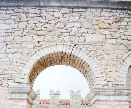 stones arc through the sky