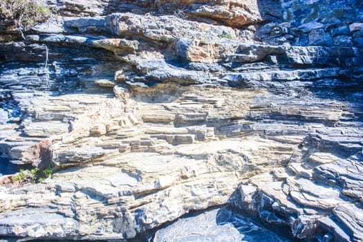 view of a very hard rock cliff background