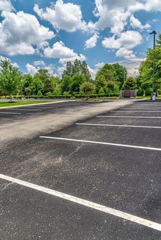 Vertical shot of an empty business parking lot during the pandemic.