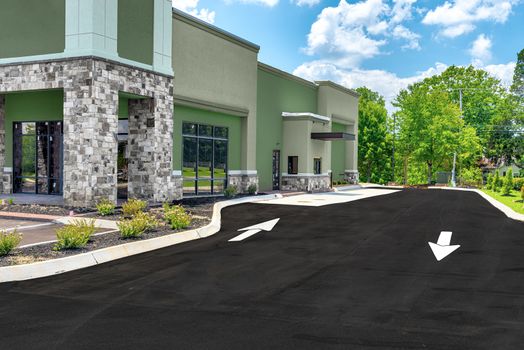 Horizontal shot of a new fast food restaurant drive thru under construction.