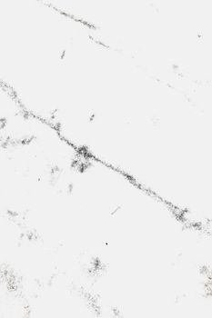 Textured white marble background. Copy space.