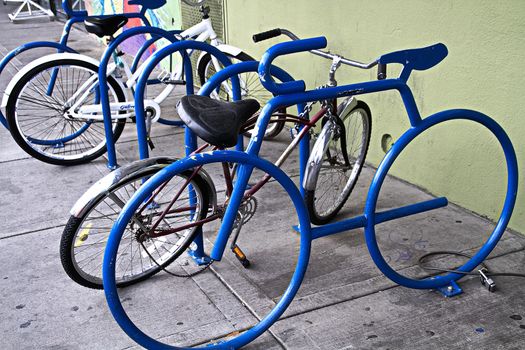 A bike parking opportunity with a symbol.bike parking Bicycle racks in bicycle parking facility Modern bike storage in the form of a steel spiral Bicycle parking.