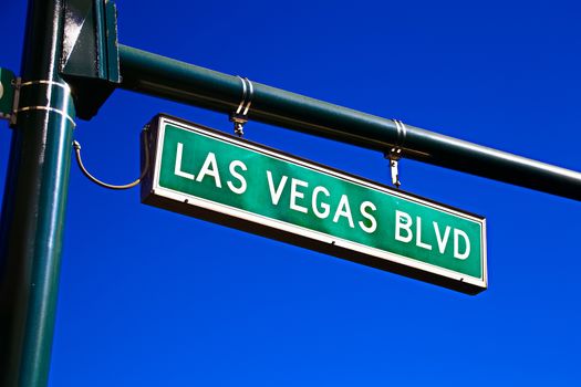Road sign of Las Vegas BLVD.Street sign of Las Vegas Boulevard.Green Las Vegas Sign with blue sky Background.