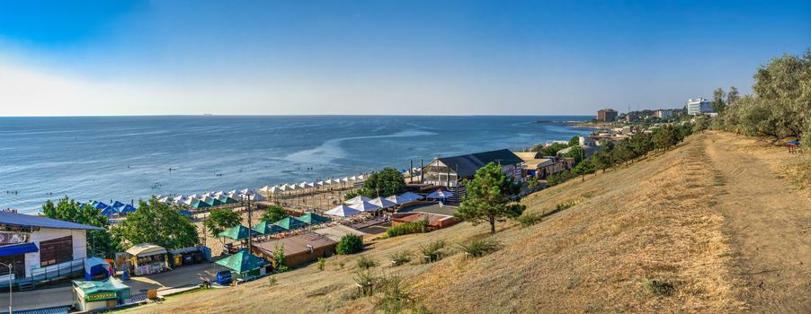 Chernomorsk, Ukraine 08.22.2020. Panoramic view of the Public beach in Chernomorsk city on a sunny summer morning