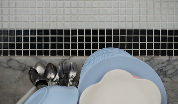 plates on drying board at the kitchen