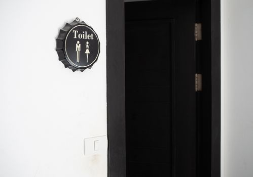 Male and female toilet sign.