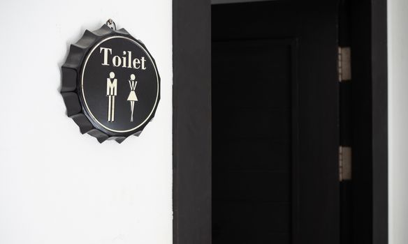 Male and female toilet sign.