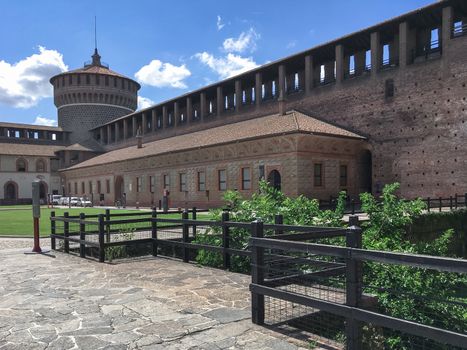 Inside the Sforza Castle (Castello Sforzesco) in Milan (ITALY). One of the main travel attractions of Milan, this castle was built in 15th century by Duke of Milan Francesco Sforza. Milan, ITALY - July 7, 2020.