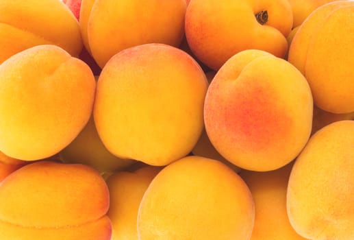 Ripe apricots background. Fruit close-up. Top view.