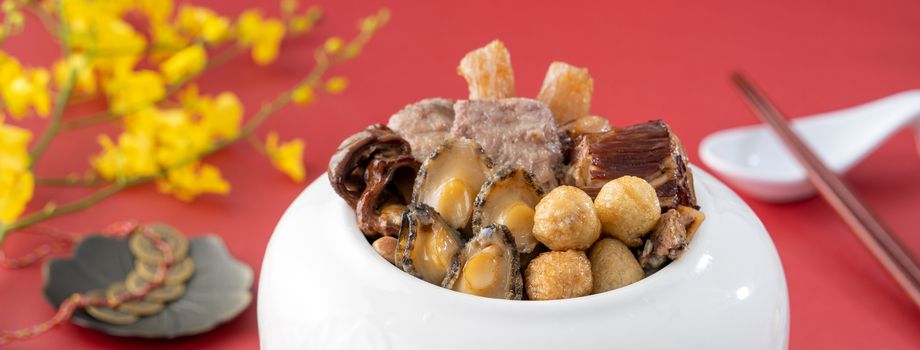 Traditional food of Chinese lunar new year, Buddha jumps over the wall, Chinese Soup Casserole dish, Buddha's Temptation, named Fo Tiao Qiang, close up.