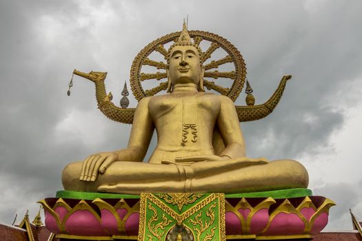 Giant and golden Big Buddha statue in Wat Phra Yai temple Koh Samui island in Surat Thani, Thailand.