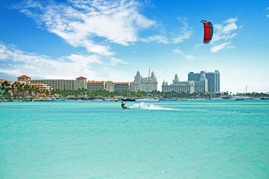 Kite surfing at Palm Beach on Aruba island in the Caribbean Sea