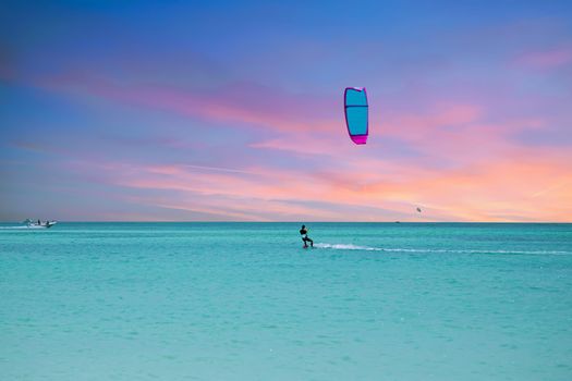 Kite surfing at Palm Beach on Aruba island in the Caribbean Sea