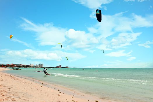 Kite surfing at Palm Beach on Aruba island in the Caribbean Sea