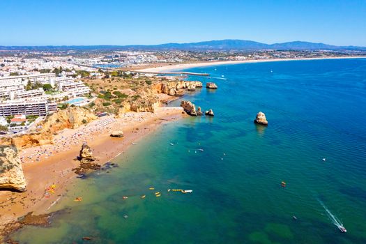 Aerial from Praia do Camillo on a rocky southcoast near Lagos in Portugal