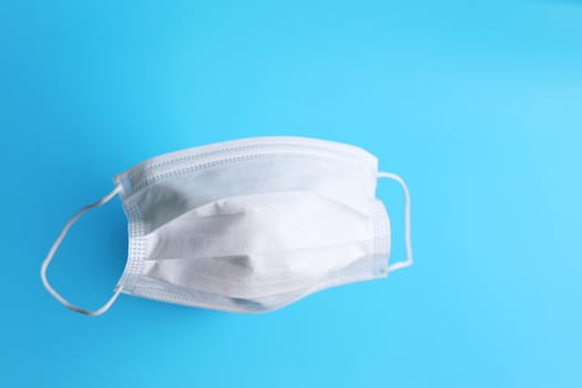 Protection mask filter on blue background