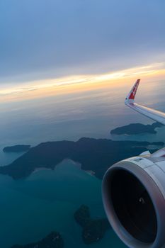 Small tropical islands aerial view from airplane