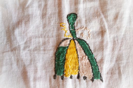 embroidered smooth decoration on white fabric , vintage folk embroidery in Belarus, of 19 century