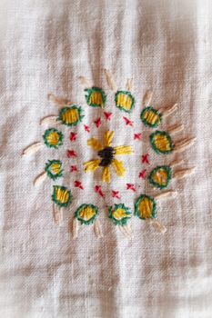 sun hand made embroidered smooth decoration on white fabric , vintage folk embroidery in Belarus, second half of 19 century