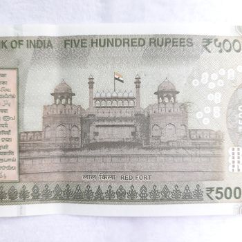 Indian new rupees currency notes took close view of rupee notes in white paper