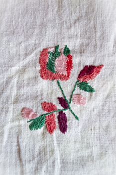 rose hand made embroidered smooth decoration on white fabric , vintage folk embroidery in Belarus, second half of 19 century