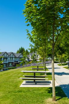 Recreation area with chess table on the block of new townhouses