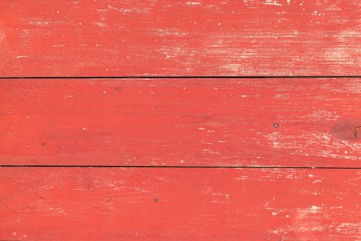 Worn red board wall background. Copy space.