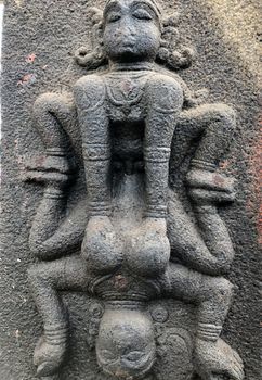 Ancient stone carvings of beautiful sculptures found in the temple in Tamilnadu. Beautiful bas-relief sculptures carved in the granite stone walls.