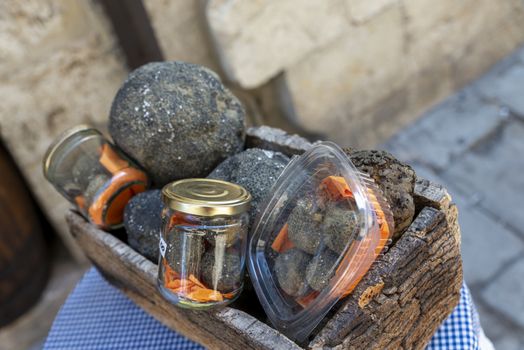 basket of truffles displayed outside a shop ready for sale