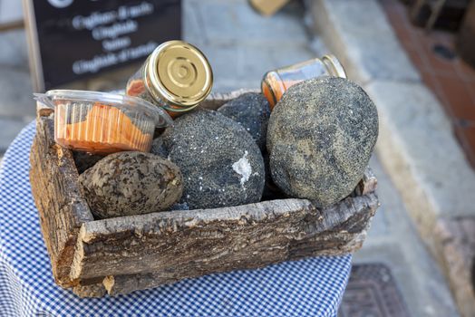basket of truffles displayed outside a shop ready for sale